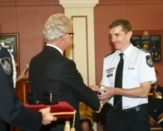 Cropped Image Receiving Group Bravery Citation